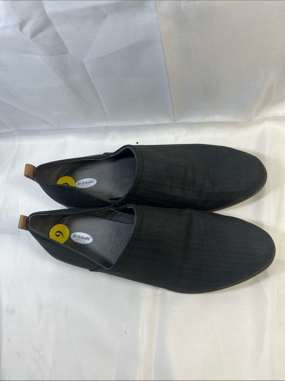 Dr. Scholl's Black women’s Slip-On Casual Loafers with Tan Heel Tab